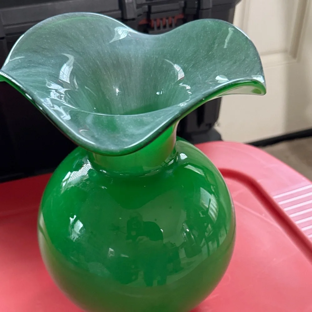 Elegant Hibiscus Fluted Vase in green glass.